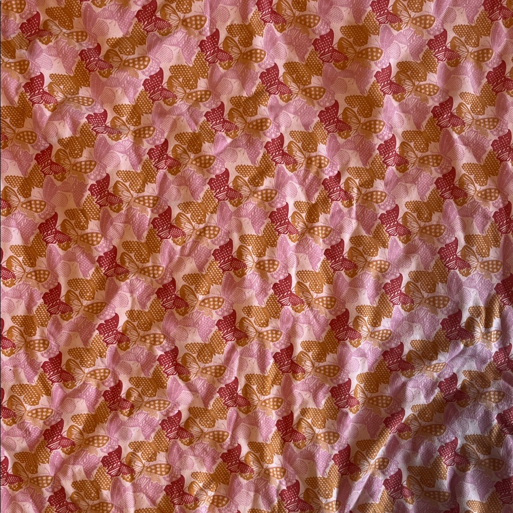 Kate Quinn pink and orange butterfly print baby blanket